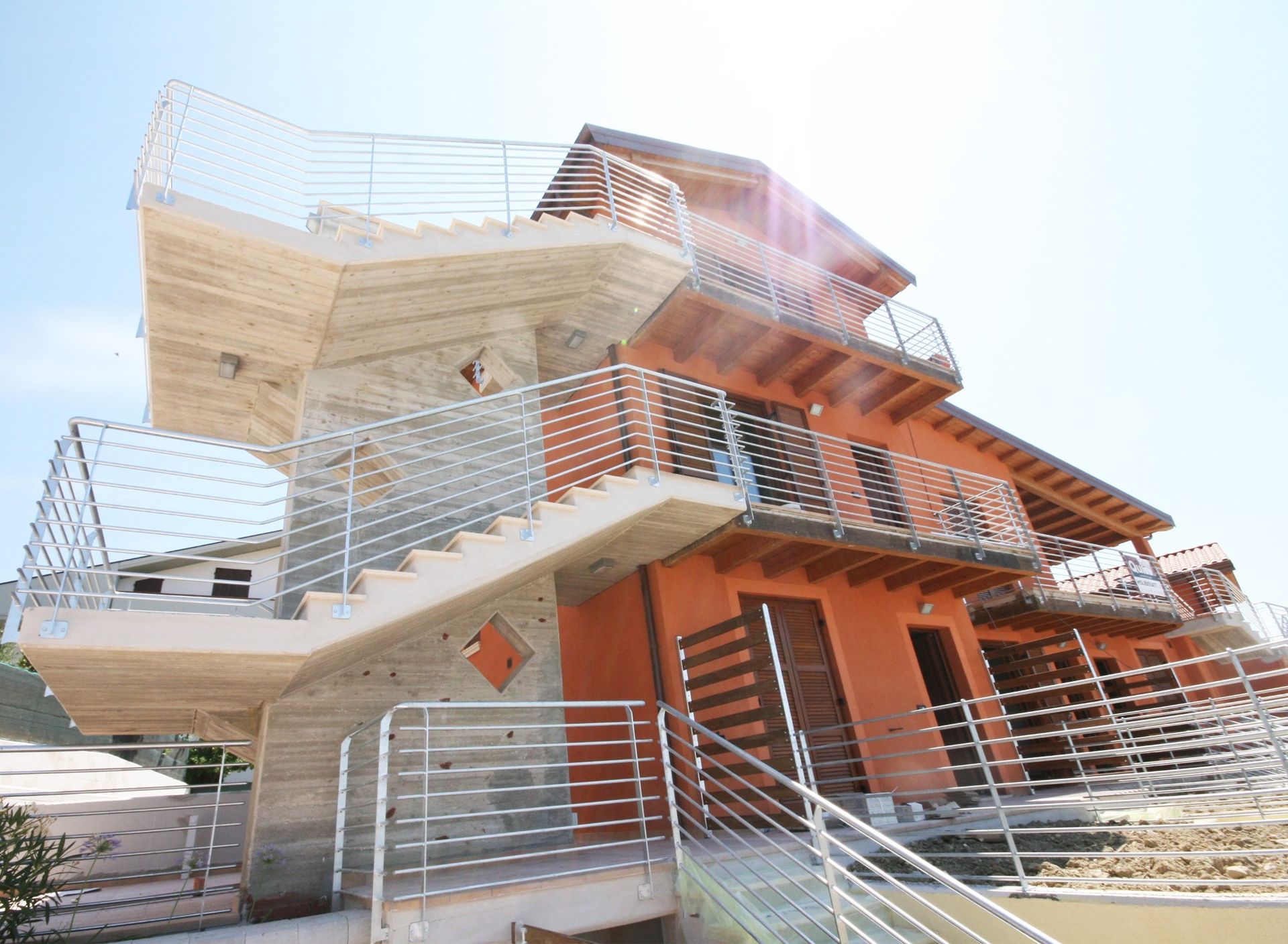 Foto lottizzazione residenziale di case in legno: realizzazioni di bioarchitettura