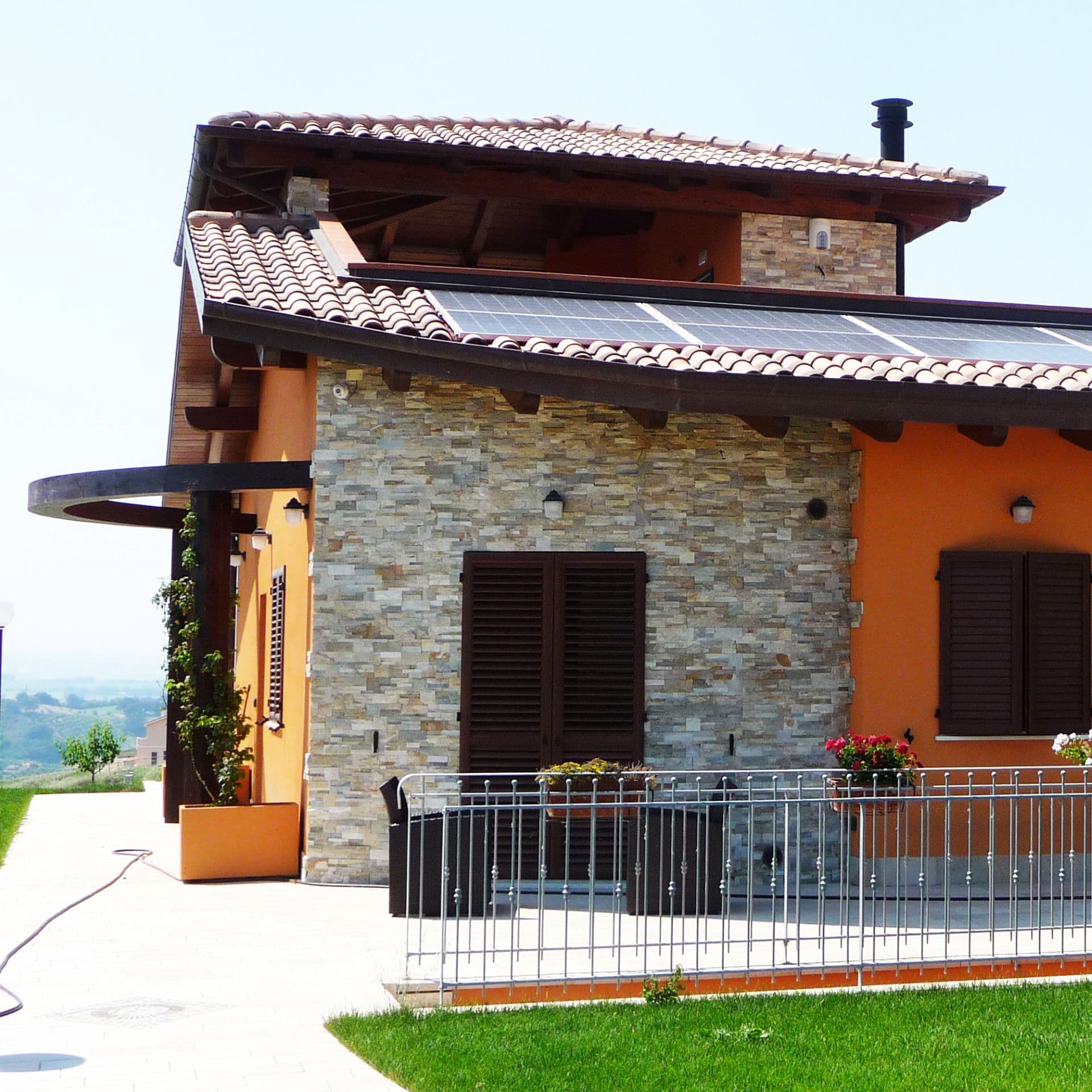 Foto realizzazioni architettura residenziale lottizzazioni villetta pietra intonaco polverigi ancona