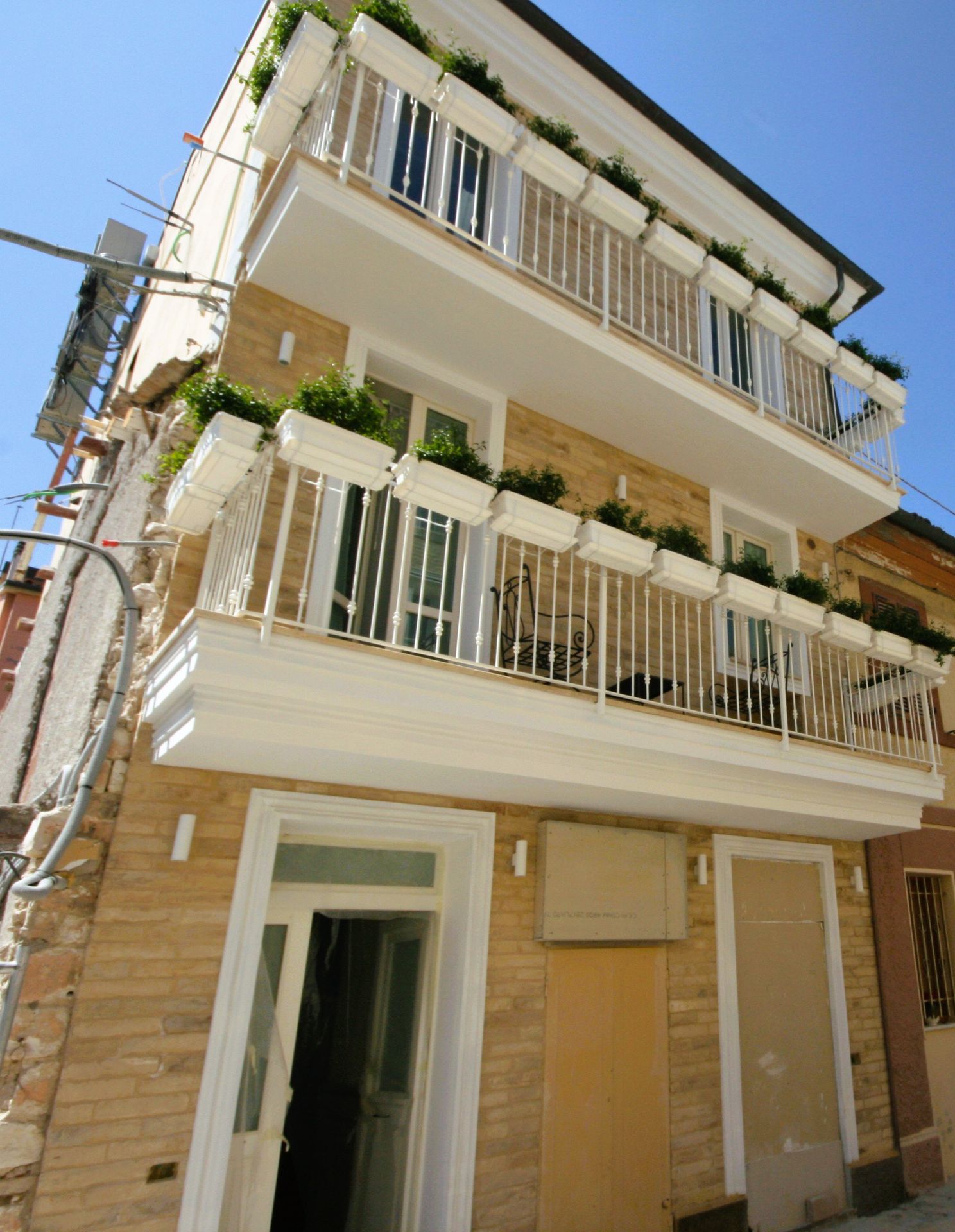 Foto ristrutturazione palazzina: appartamenti turismo.